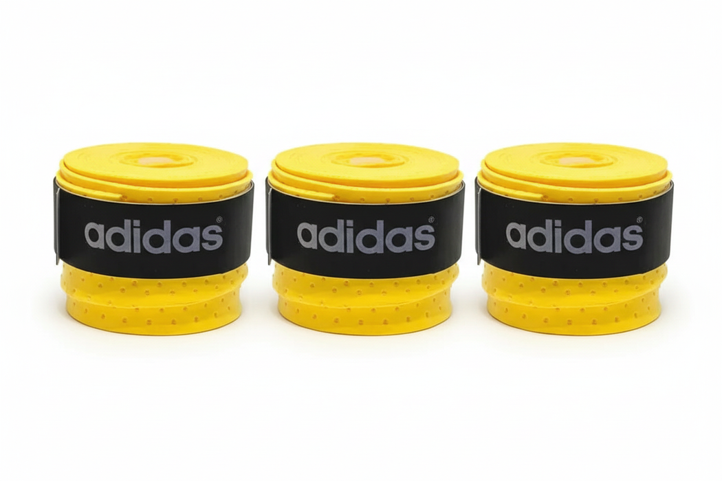Three yellow Adidas grip tapes side by side